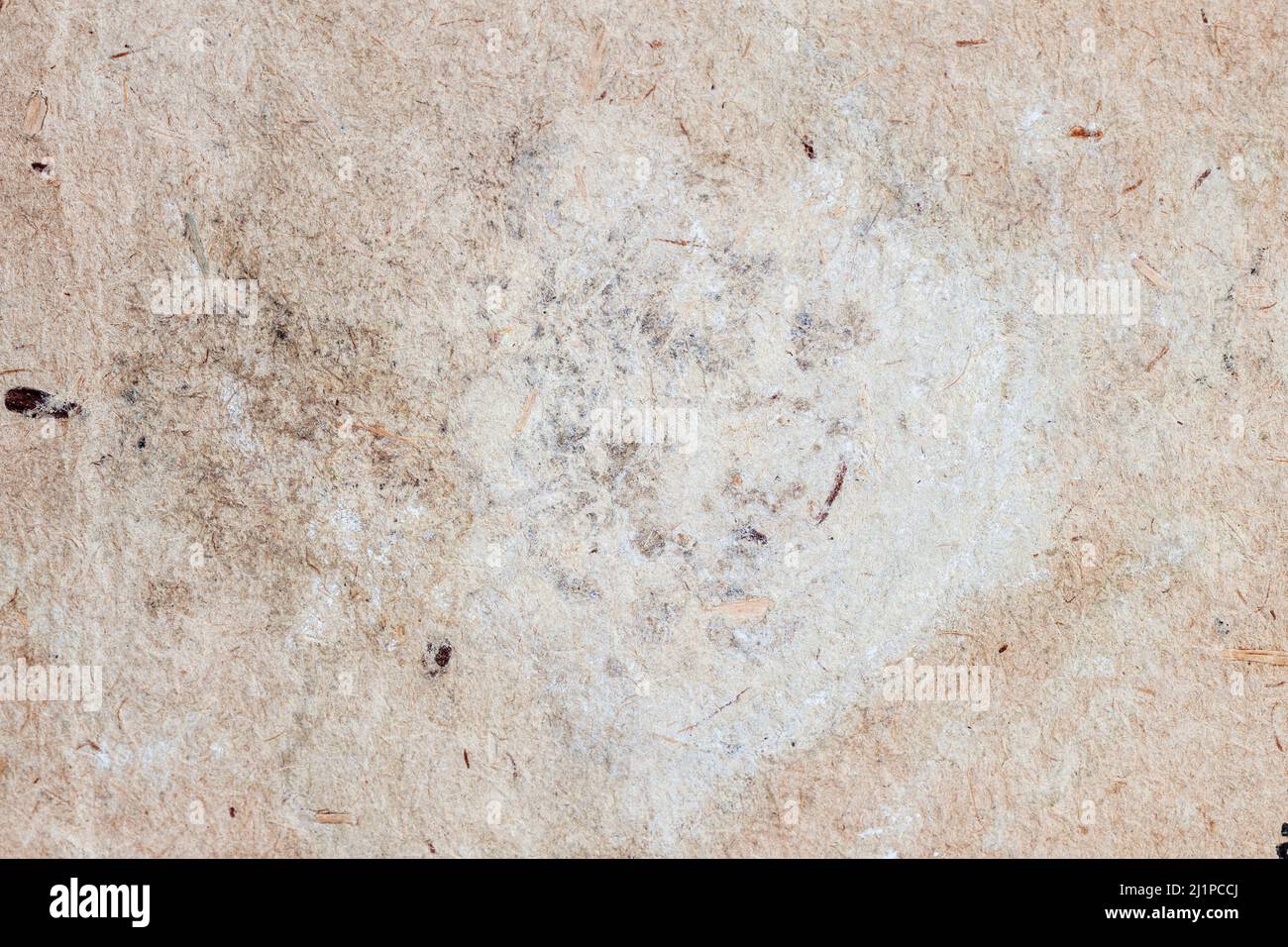 Texture du papier ancien, surface éraflée, taches de saleté, taches. Arrière-plan vintage Banque D'Images