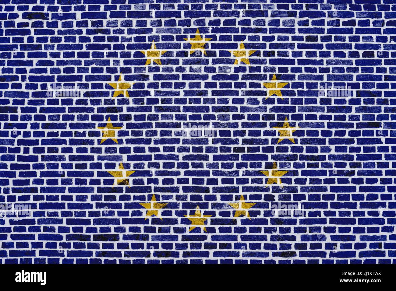 Gros plan sur un mur de briques avec le drapeau de l'Union européenne peint dessus. Banque D'Images