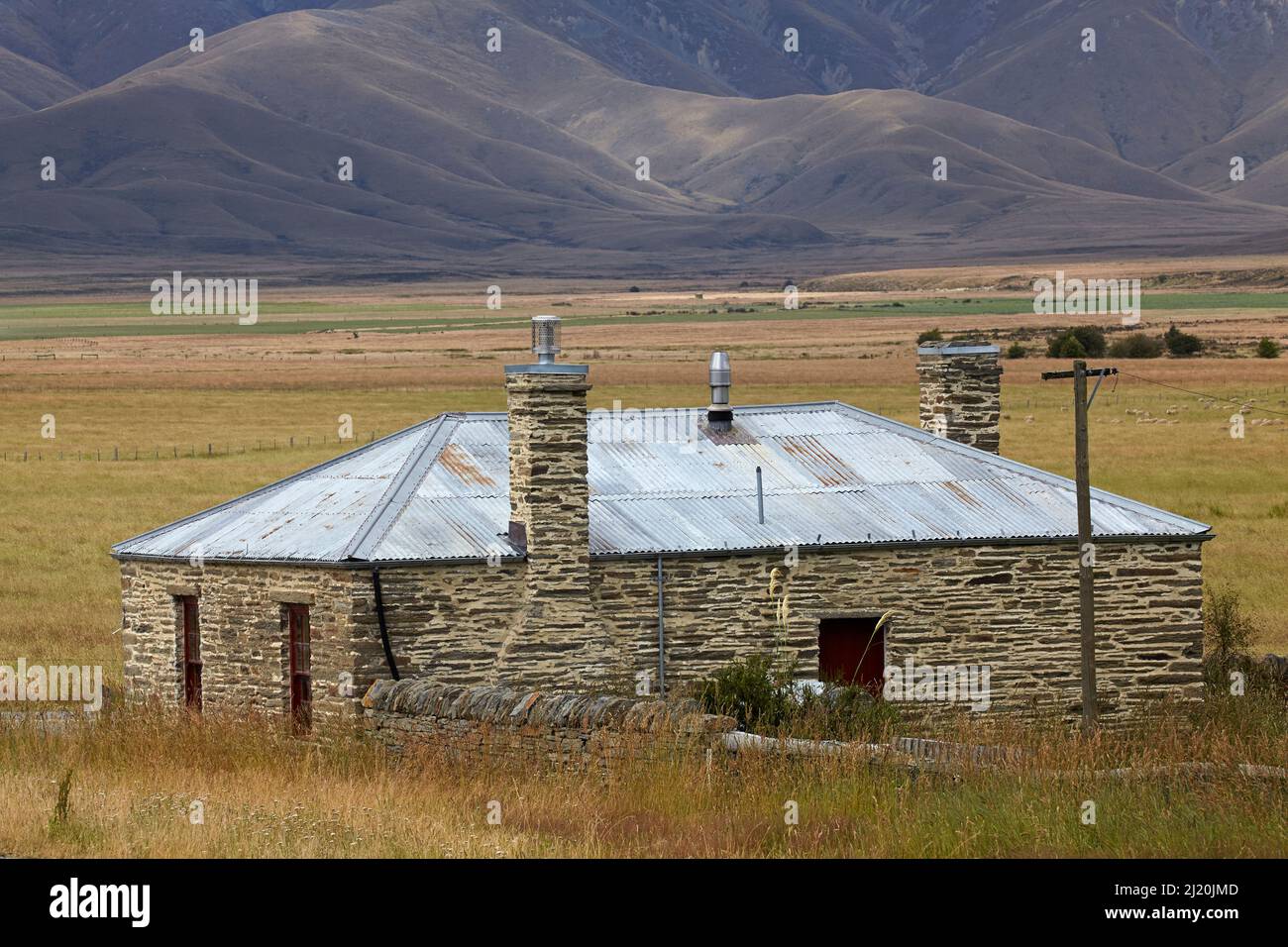 Cottage en pierre historique, Hills Creek, Maniototo, Central Otago, île du Sud, Nouvelle-Zélande Banque D'Images