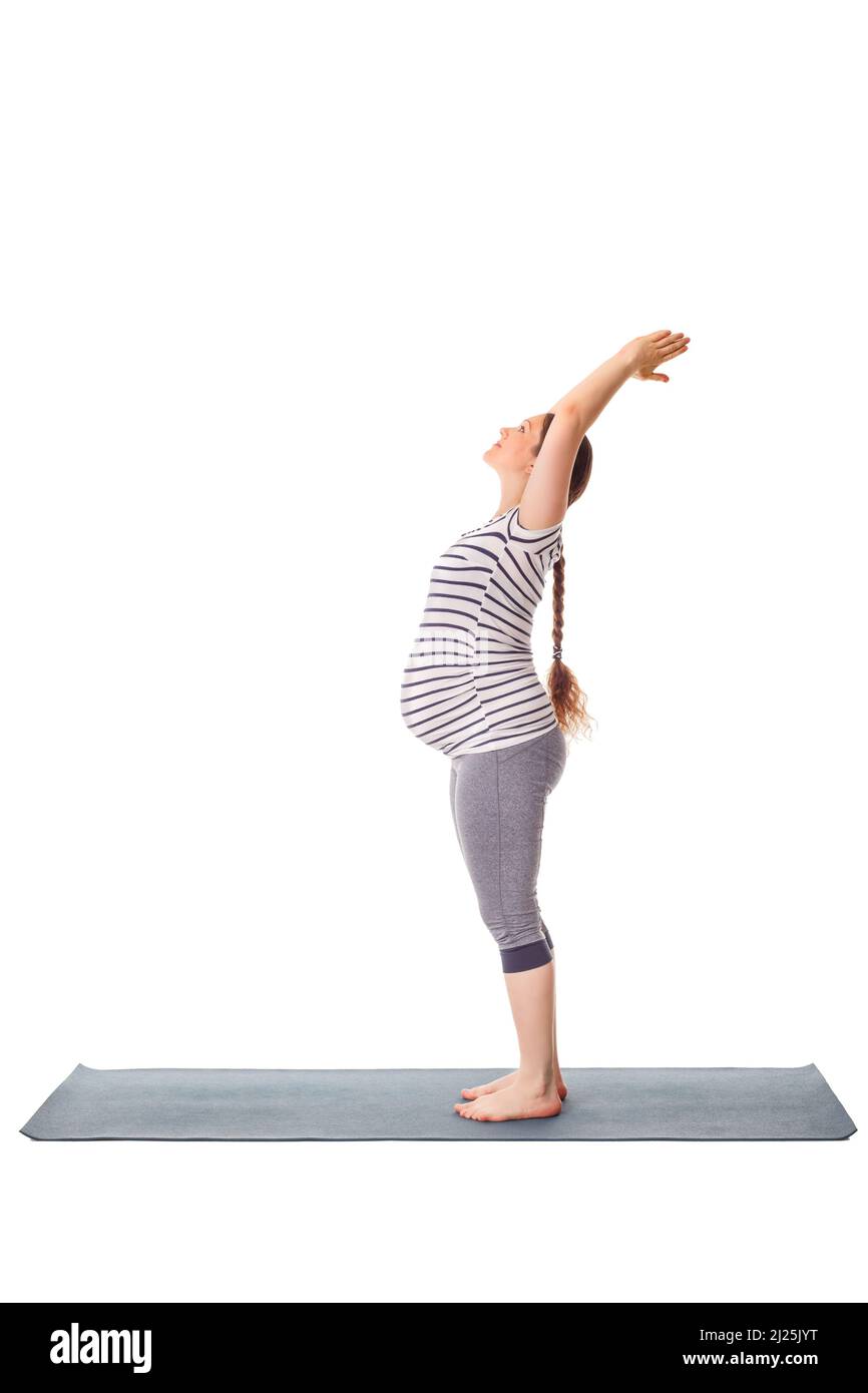 Femme enceinte faisant du yoga asana ... Banque D'Images