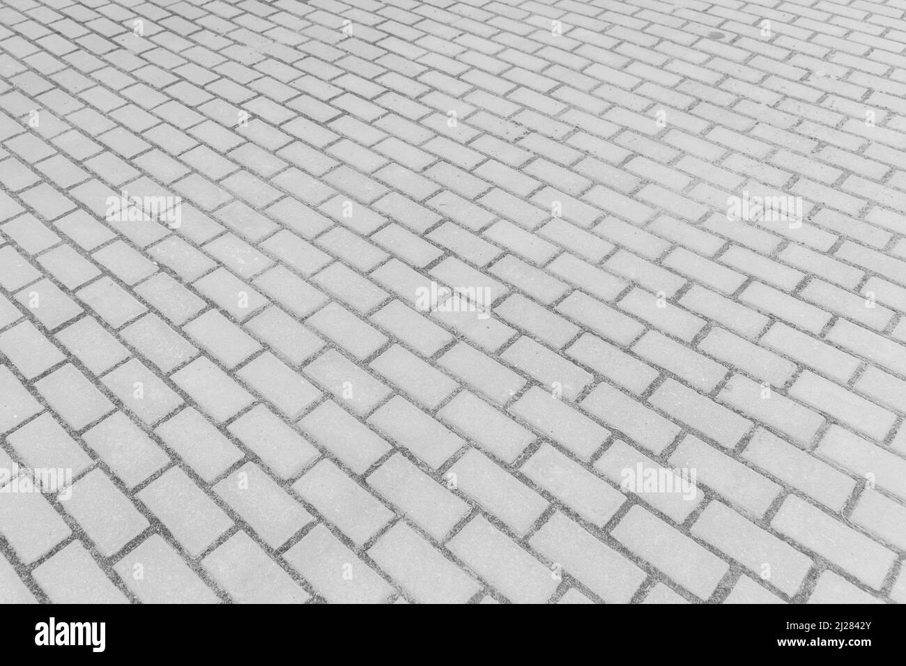 Carrelage gris rue pierre ville route abstrait modèle urbain design texture revêtement fond de plancher. Banque D'Images
