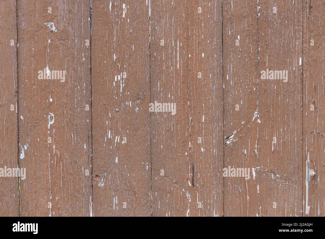 Vieux panneaux de clôture usés en bois texture abîmée brun sale obsolète arrière-plan de la planche. Banque D'Images