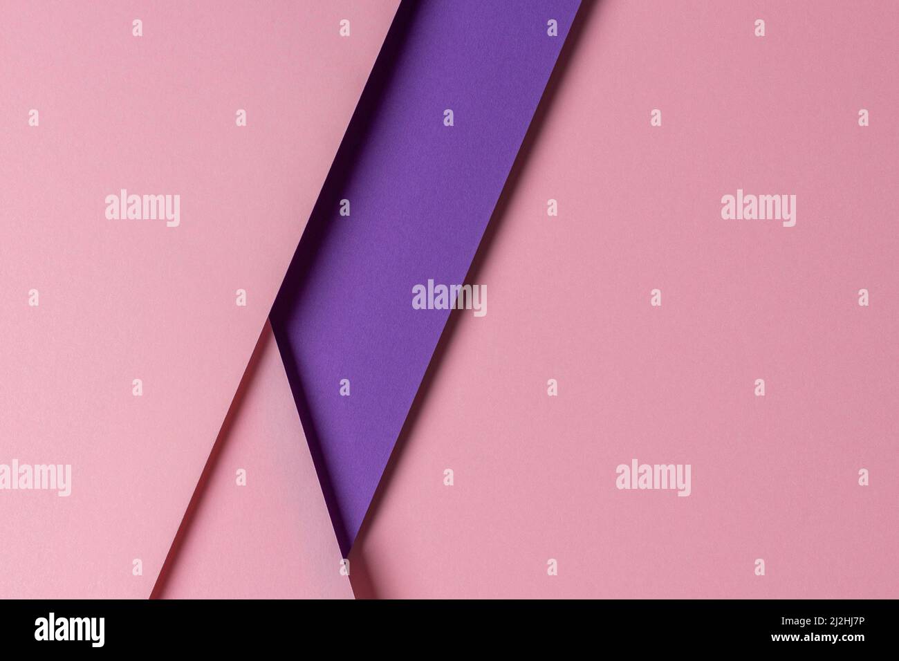 Résumé géométrique de papier rose pastel et violet avec espace de copie Banque D'Images