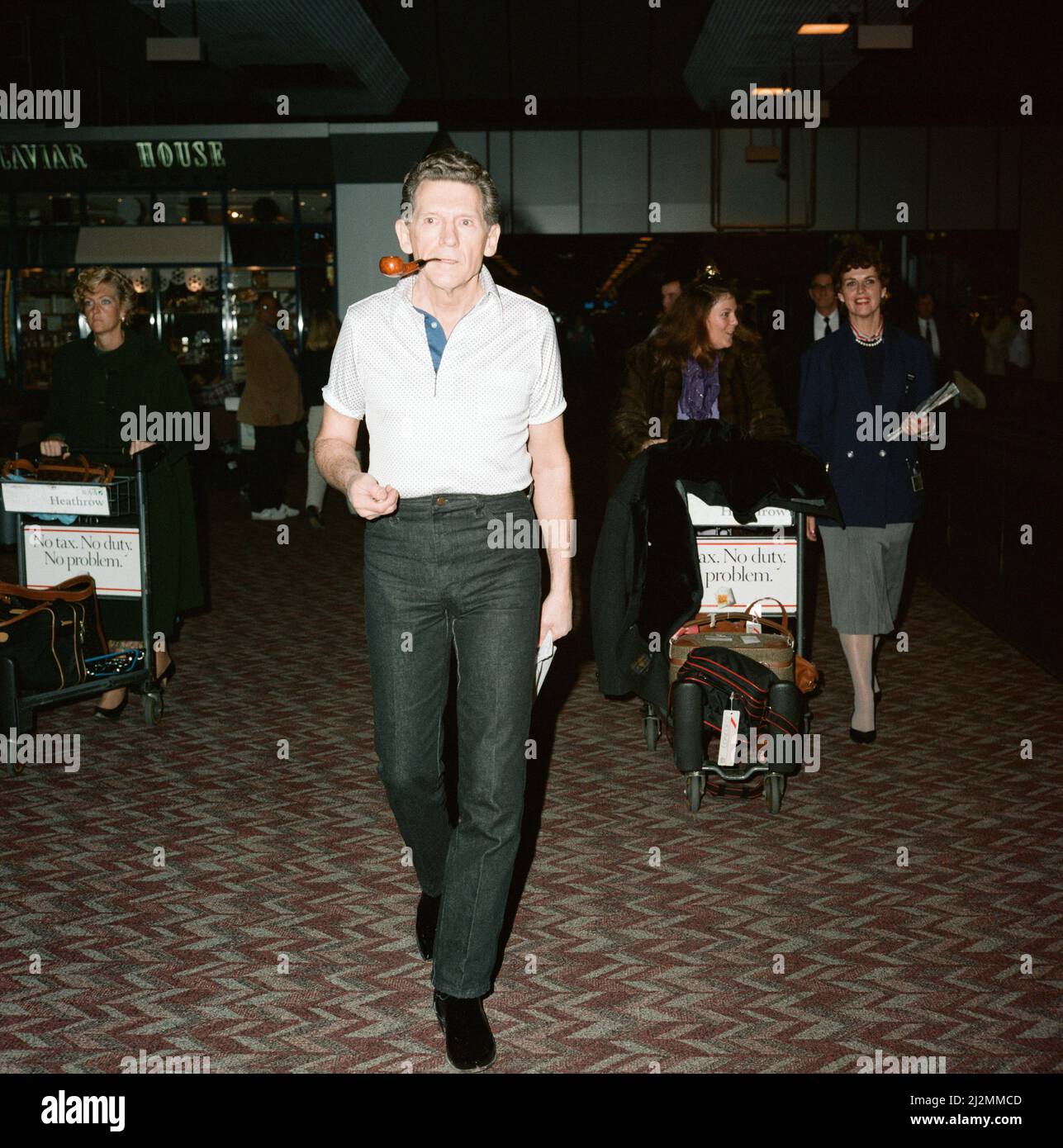 Jerry Lee Lewis à l'aéroport de Heathrow. 22nd novembre 1989. Banque D'Images