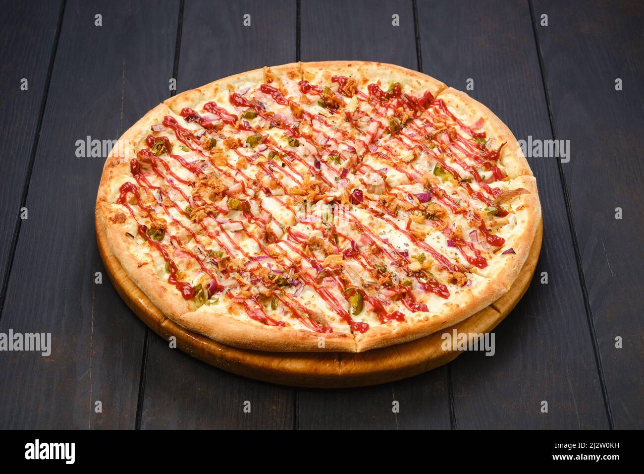 Pizza mexicaine avec bacon, oignon et piment Banque D'Images