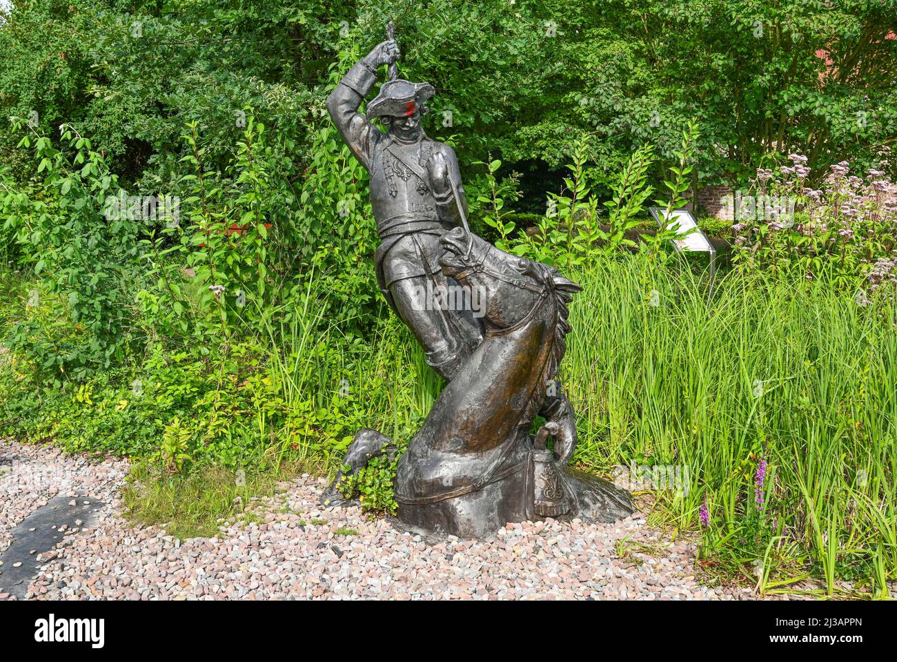 Sculpture sortant du marais par le Pigtail, Baron de Munchaussen, Munchaussen Town Bodenwerder, Basse-Saxe, Allemagne Banque D'Images