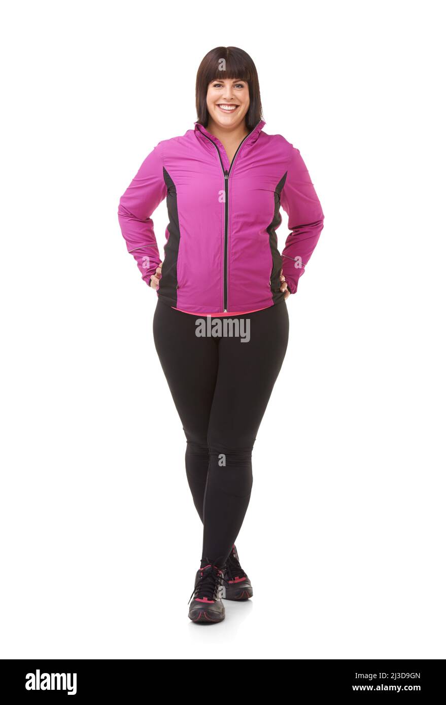 Prêt à être mis en forme. Portrait d'un modèle de taille plus en vêtements d'exercice sur fond blanc. Banque D'Images