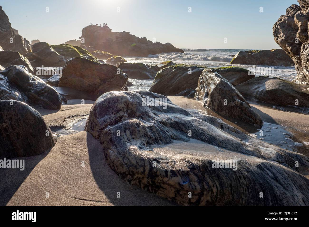 Mexique, Etat d'Oaxaca, Puerto Escondido et sa plage, la Punta Zicatela, le sud de la plage a une zone rocheuse Banque D'Images