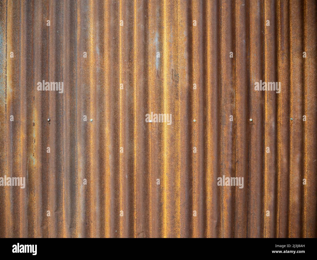 Arrière-plan de la texture du mur en zinc ancien, rouillé sur une tôle de tôle galvanisée. Banque D'Images
