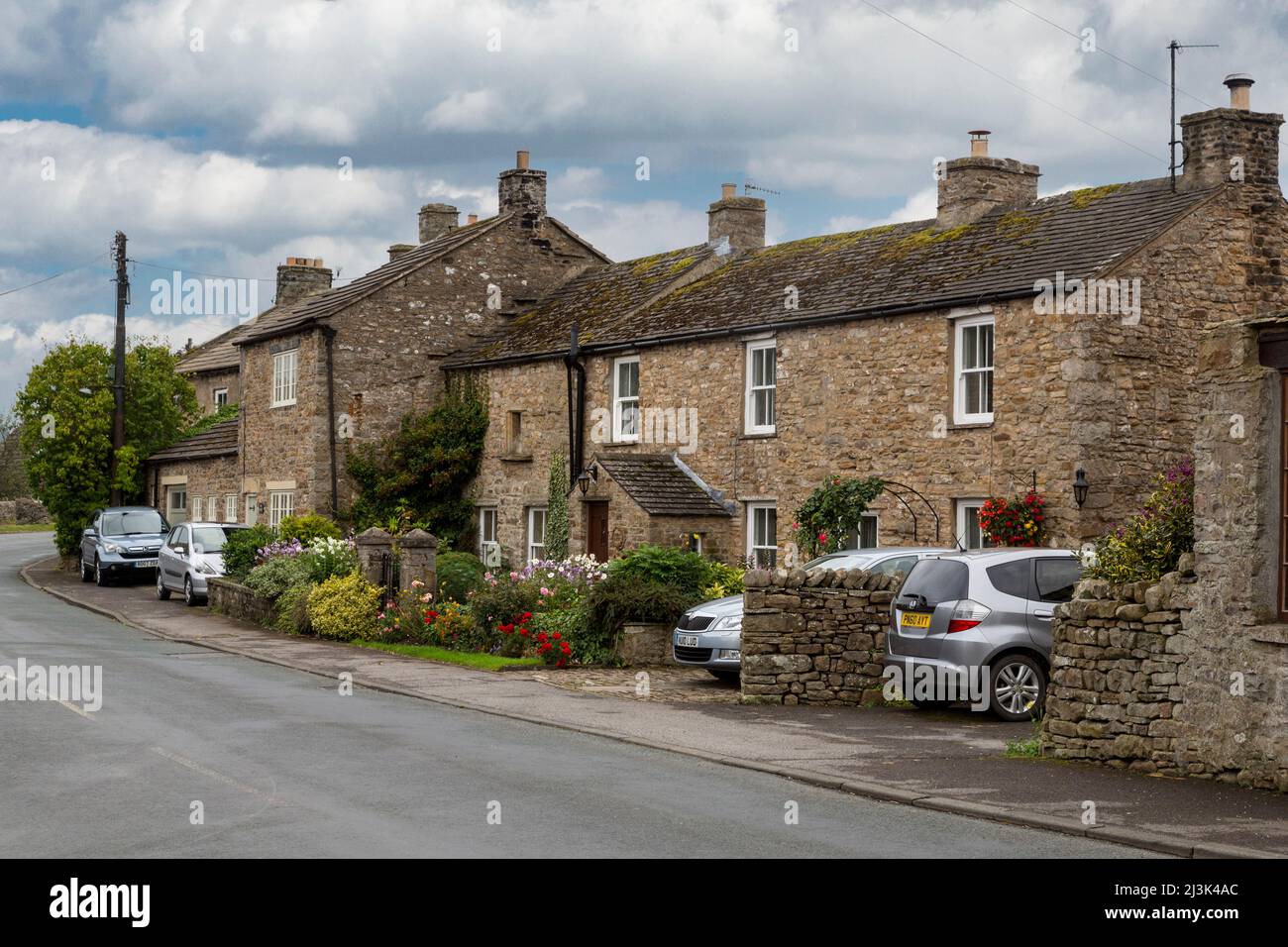 Royaume-uni, Angleterre, dans le Yorkshire. Maisons de village, Grinton. Banque D'Images