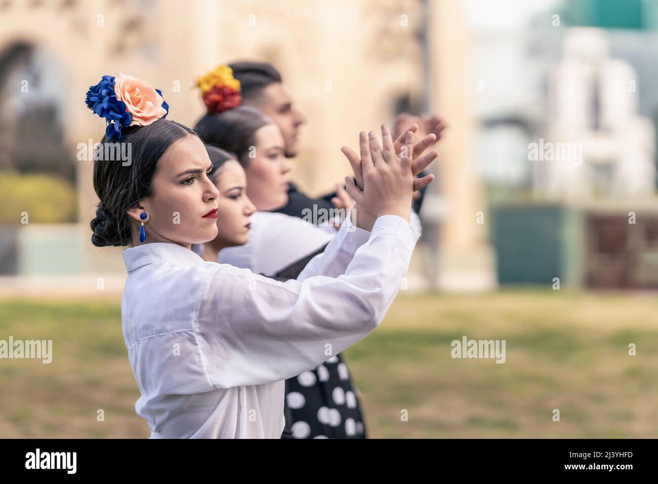 4 élèves d'une école de flamenco qui se claque les mains Banque D'Images