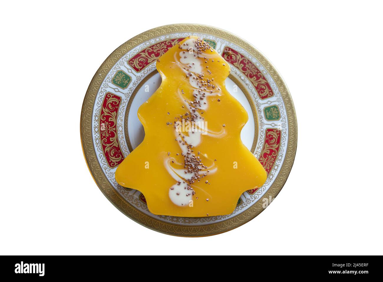 Cheesecake à la mangue en forme d'arbre de Noël utilisé comme dessert de pudding de Noël servi à l'heure du dîner le jour de Noël ou le lendemain de Noël pendant le Banque D'Images