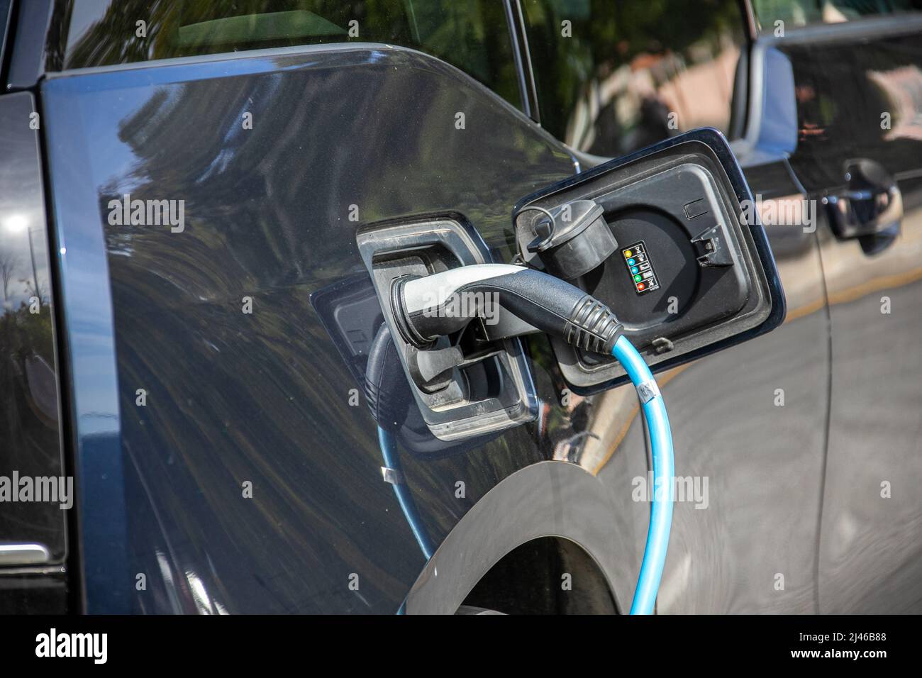 BMW i3 EV charge de véhicule électrique à un chargeur électrique GALP, Lisbonne, Portugal Banque D'Images