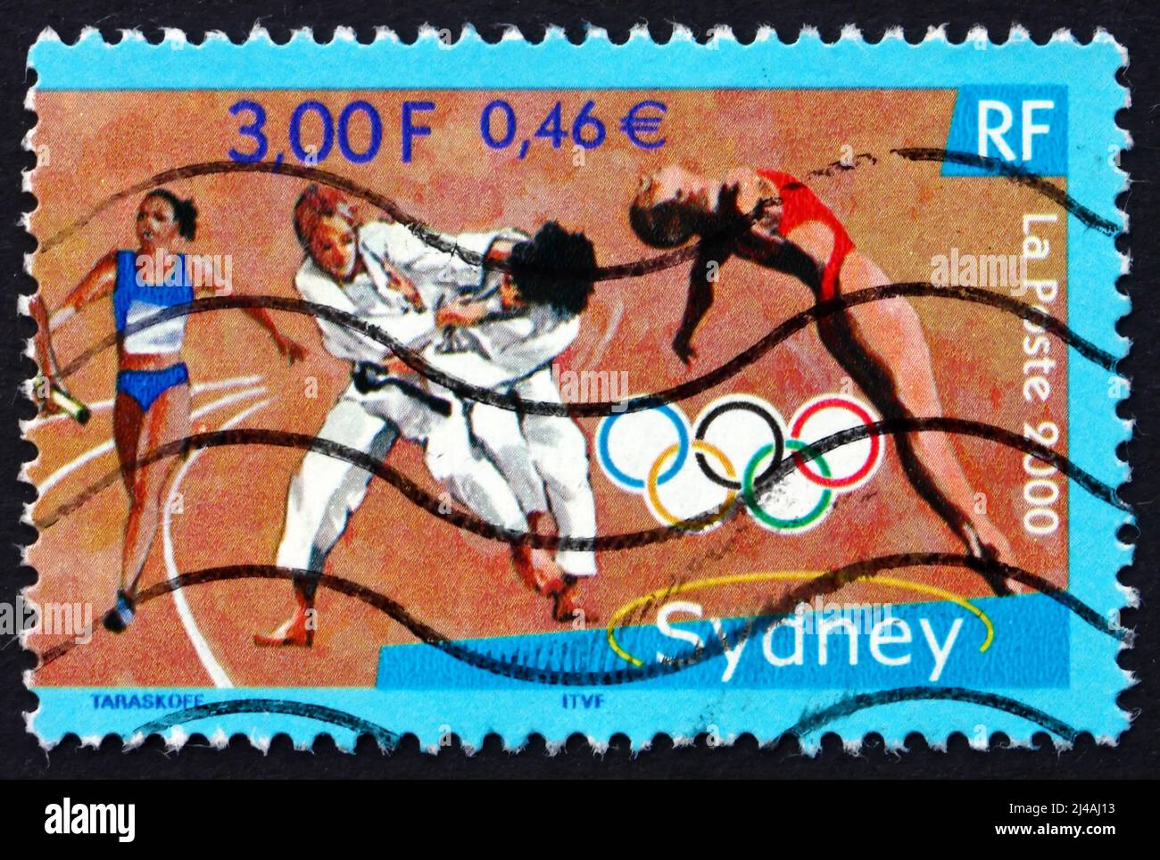 FRANCE - VERS 2000: Un timbre imprimé en France montre Relais Racer, Judo, plongée sous-marine, Jeux Olympiques d'été 2000, Sydney, vers 2000 Banque D'Images