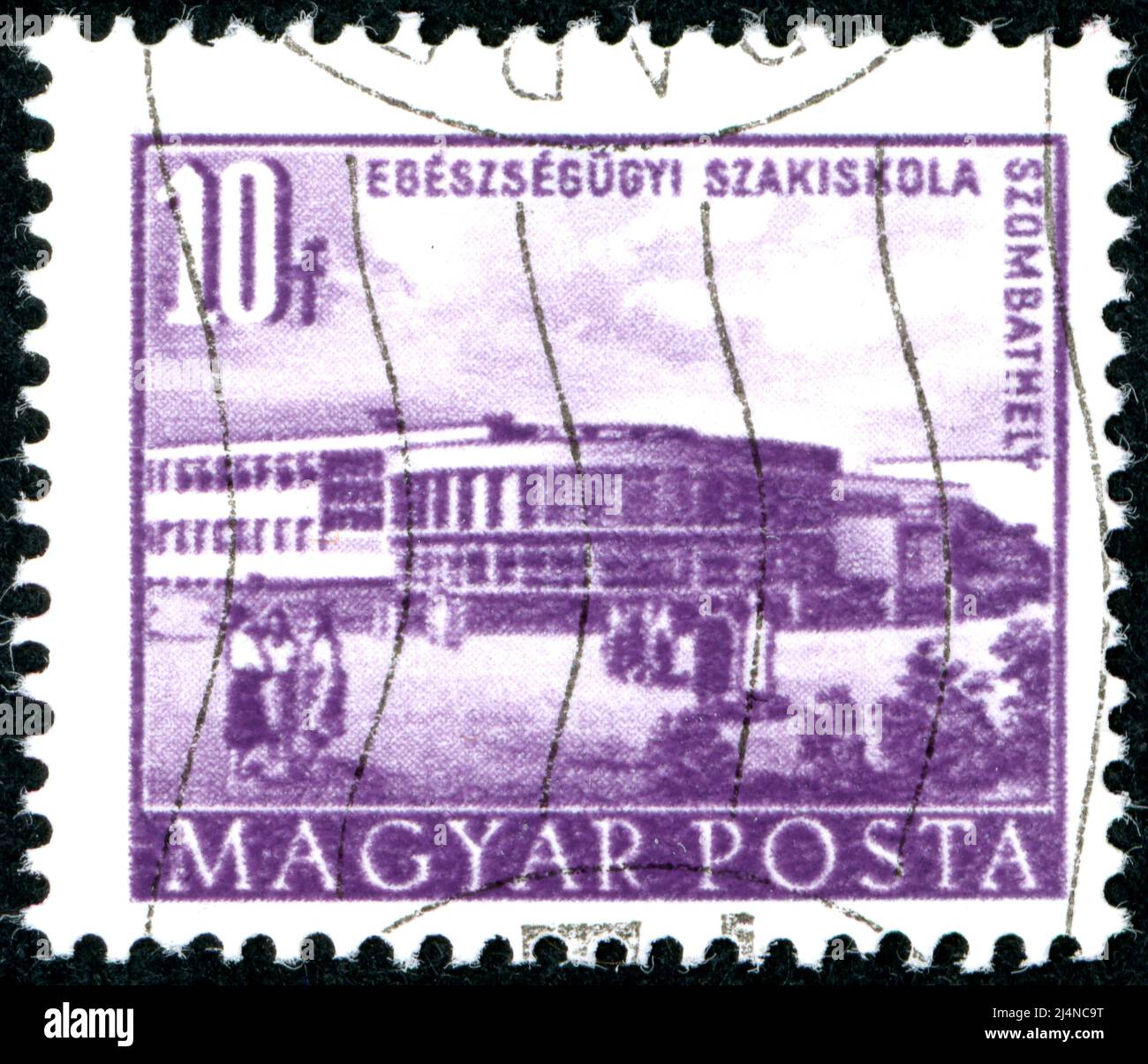 HONGRIE - VERS 1953 : un timbre imprimé en Hongrie, photographié École de médecine, Szombathely, vers 1953 Banque D'Images