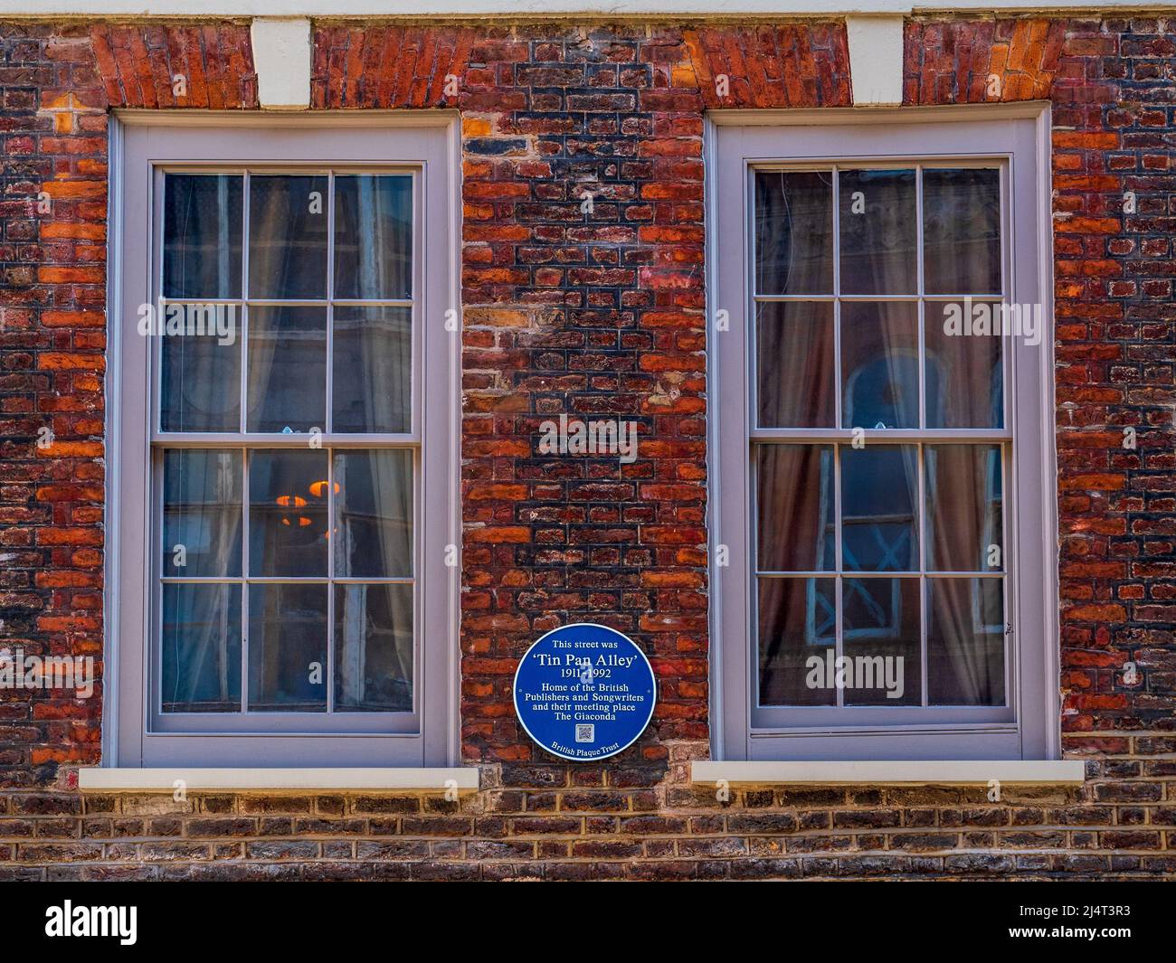 Denmark St Blue plaque - cette rue était 'Tin Pan Alley' 1911-1992 maison des éditeurs et compositeurs britanniques et leur lieu de rencontre le Giaconda Banque D'Images