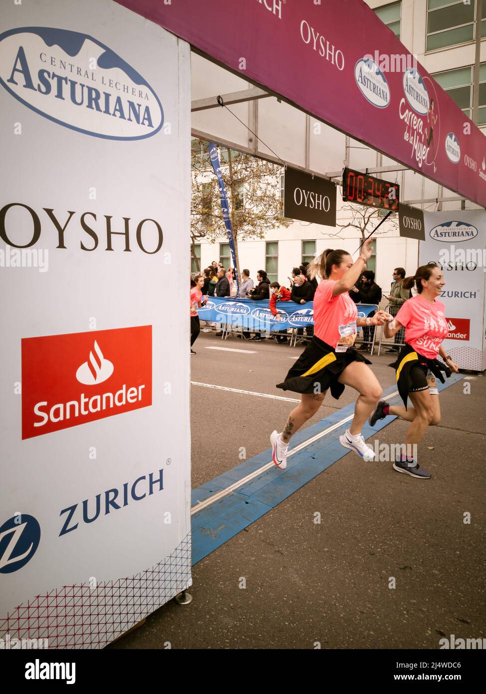 Femme course contre le cancer à Valence, Espagne Banque D'Images