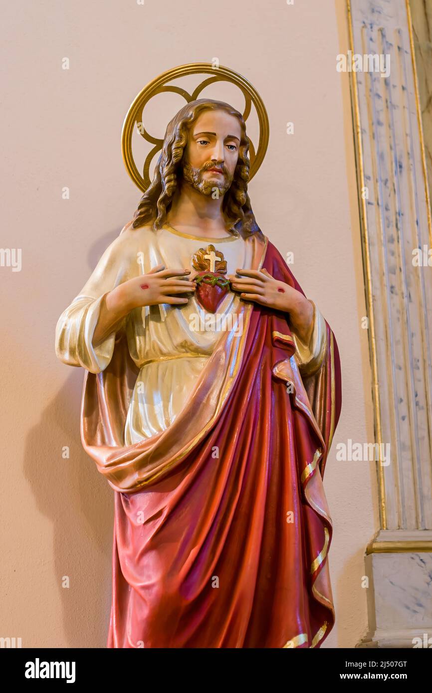 Le cœur effrayé de la statue de Jésus dans l'église catholique San Felipe de Neri sur la place de la vieille ville à Albuquerque, Nouveau-Mexique. Banque D'Images