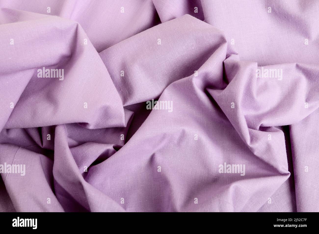 Tissu violet doux - arrière-plan ondulé. Ressources graphiques Banque D'Images