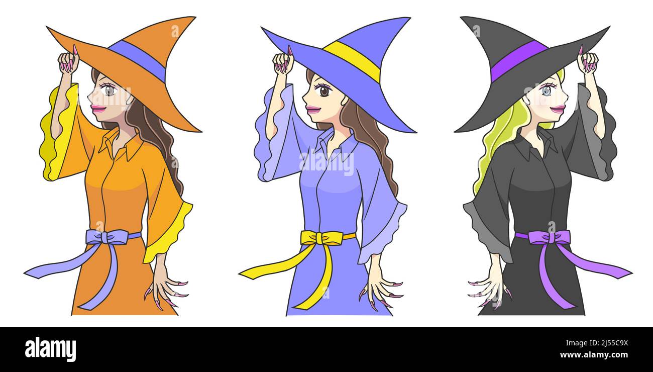 Trois jeunes femmes en costumes de sorcière posant avec leurs chapeaux Banque D'Images