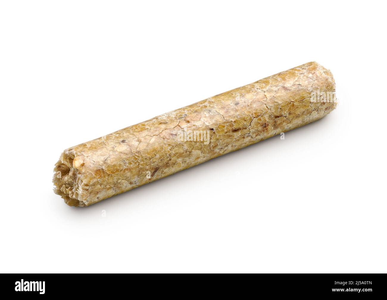 Vue rapprochée d'une seule pastille de bois, sur fond blanc. Banque D'Images