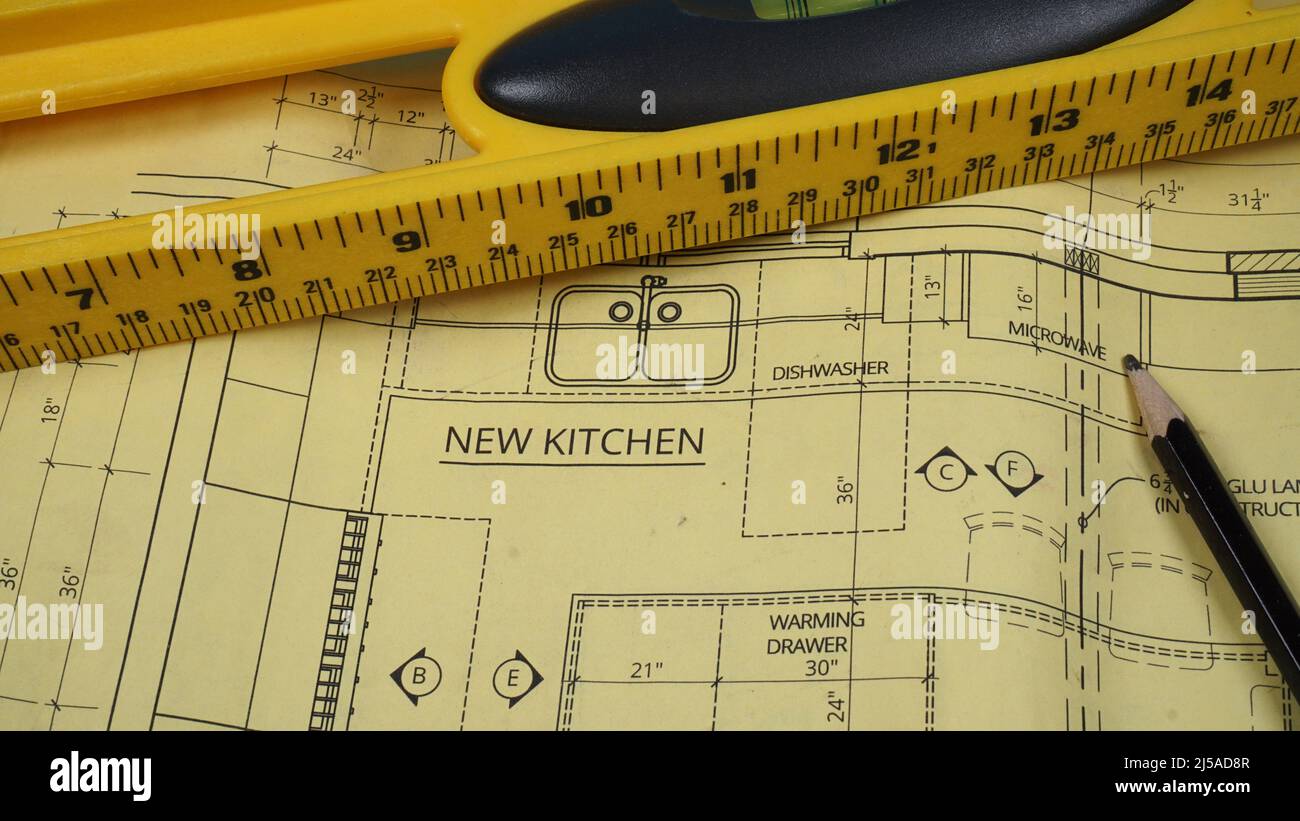 Plan pour la rénovation de la cuisine avec crayon et niveau Banque D'Images