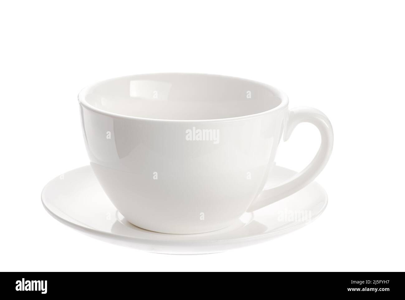 Tasses tasse de thé au lait isolé sur fond blanc Banque D'Images
