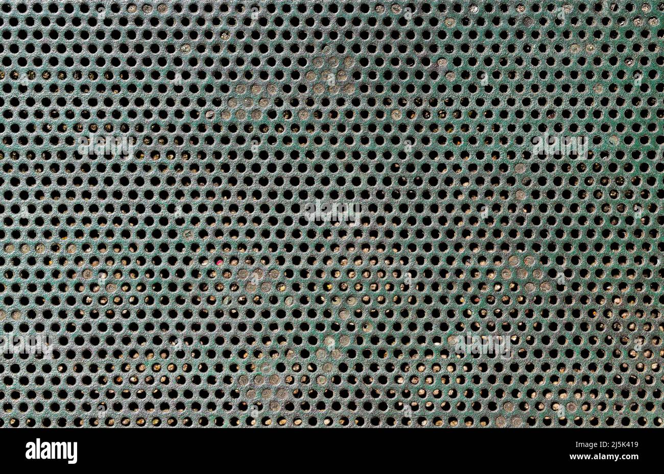 Arrière-plan de texture métallique perforée sale Banque D'Images