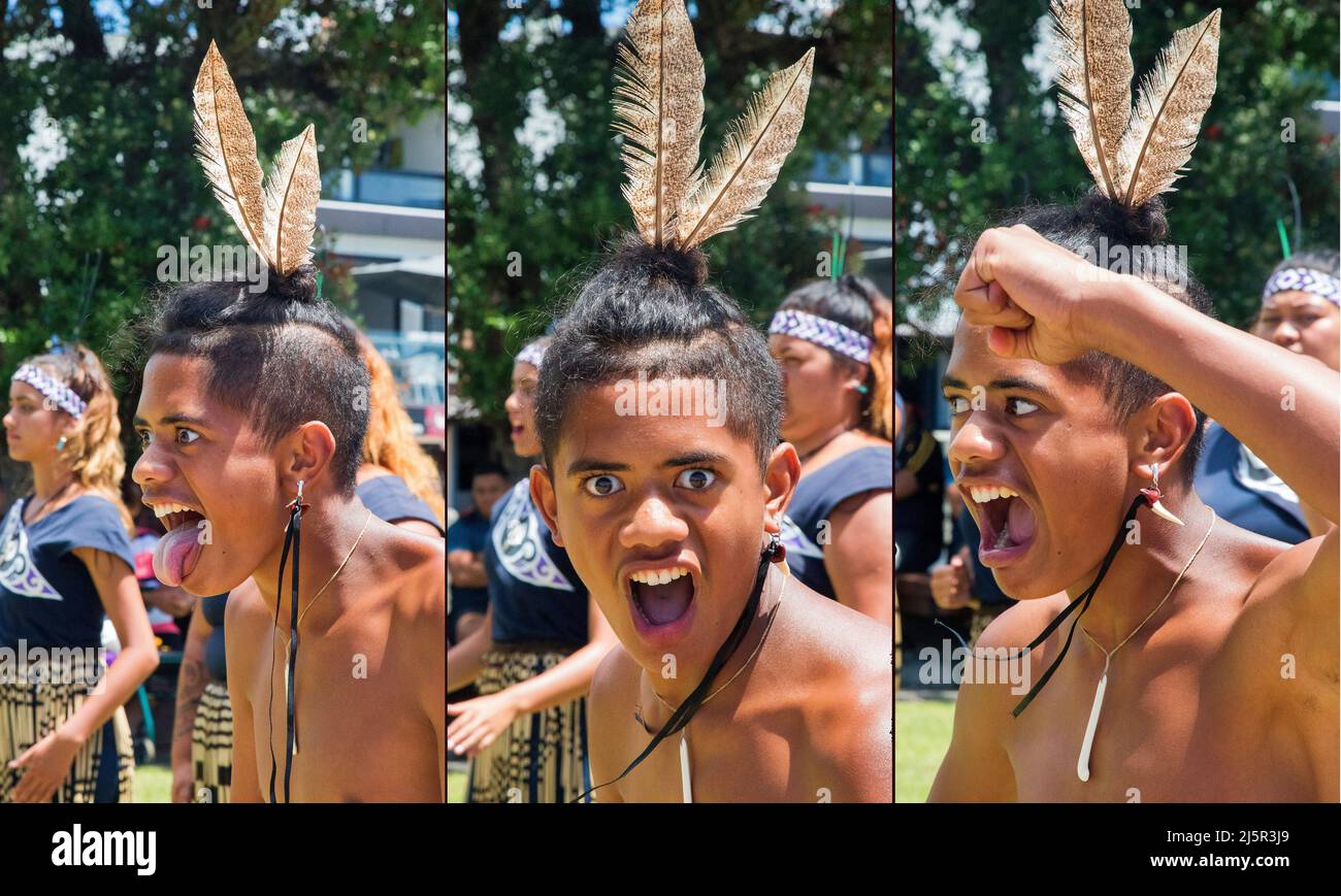 Garçon maori pendant une danse traditionnelle à Paihia, la principale ville touristique de la baie des îles, à l'extrême nord de l'île du Nord de la Nouvelle-Zélande Banque D'Images