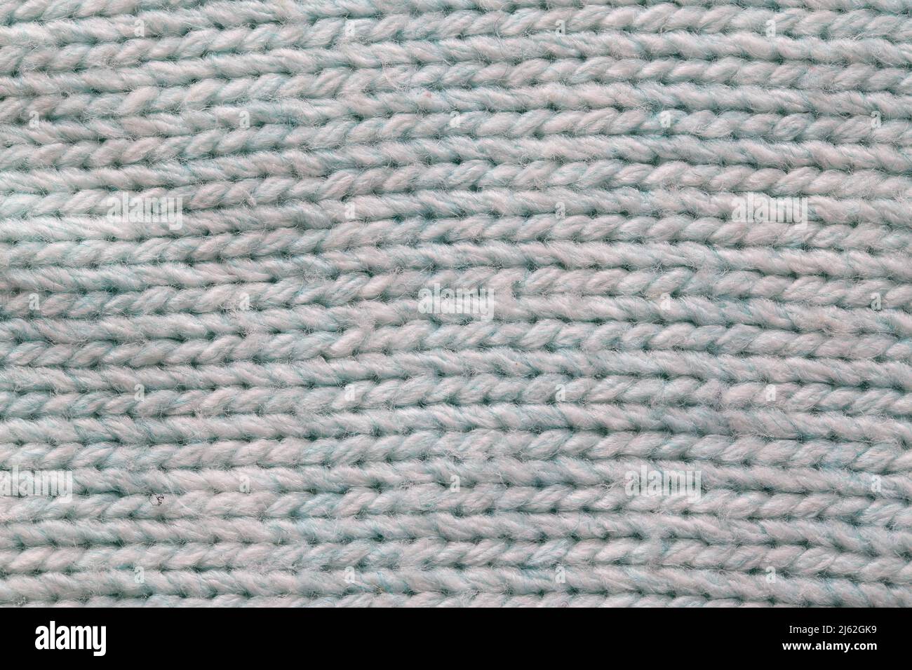 Matériau du pull gris chaud, macro d'arrière-plan Banque D'Images