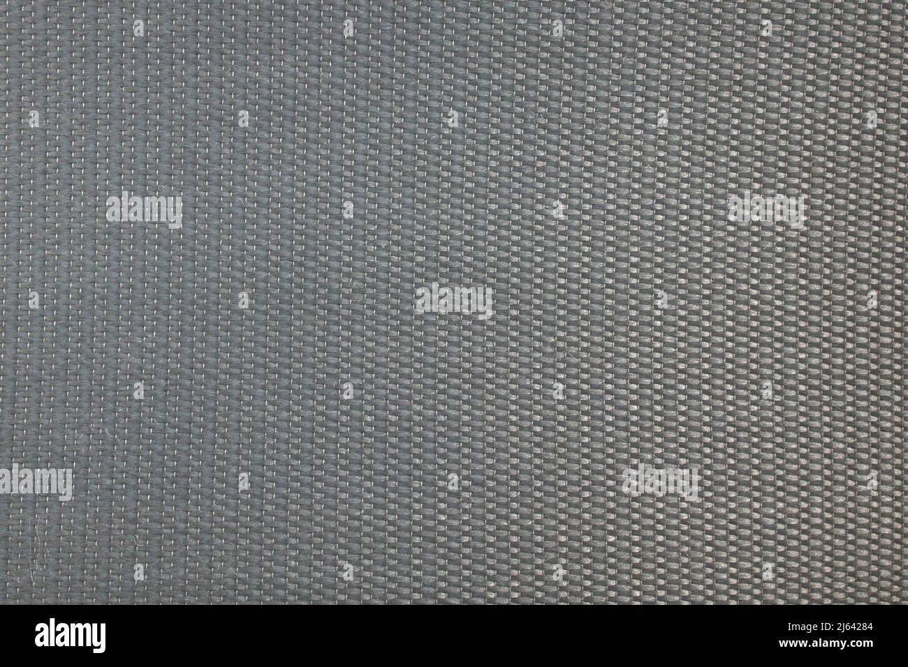 Tissu de protection solaire pour stores gris. Texture de tissu gris pour l'arrière-plan. Banque D'Images