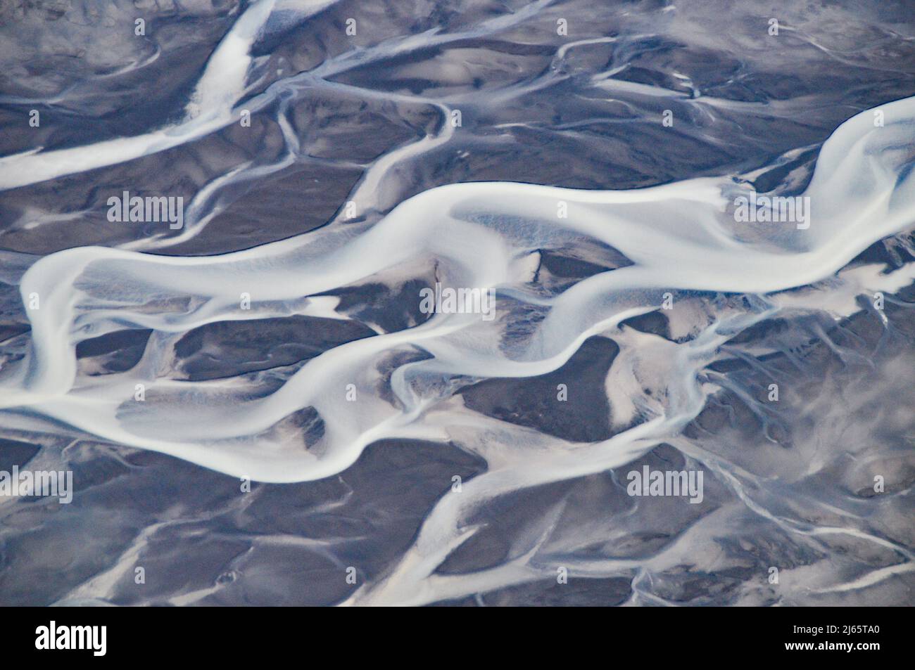 Mäandrierender Fletscherfluss - Luftaufahme (Rundflug über das südliche Hochland, île) - photographie serial d'un glacier en Islande Banque D'Images