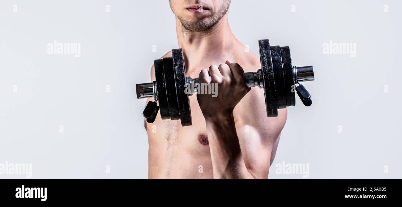 Homme Tenant Haltère à La Main. Un Type Maigre Tient Des Haltères Dans Les  Mains. Un Homme Mince Dans Le Sport Avec Des Haltères. Photo stock - Image  du humain, aptitude: 220313382