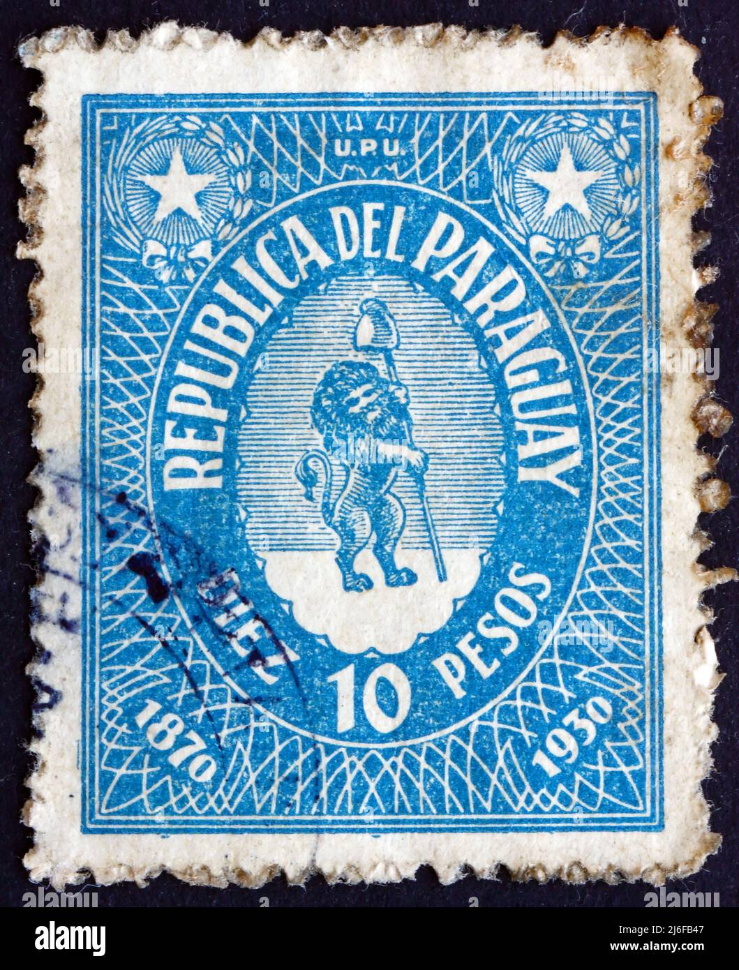 PARAGUAY - VERS 1939: Un timbre imprimé au Paraguay montre vigilants Lion soutenant Liberty Cap, 1st Paraguayan Postage Stamp, 60th anniversaire, vers 1 Banque D'Images