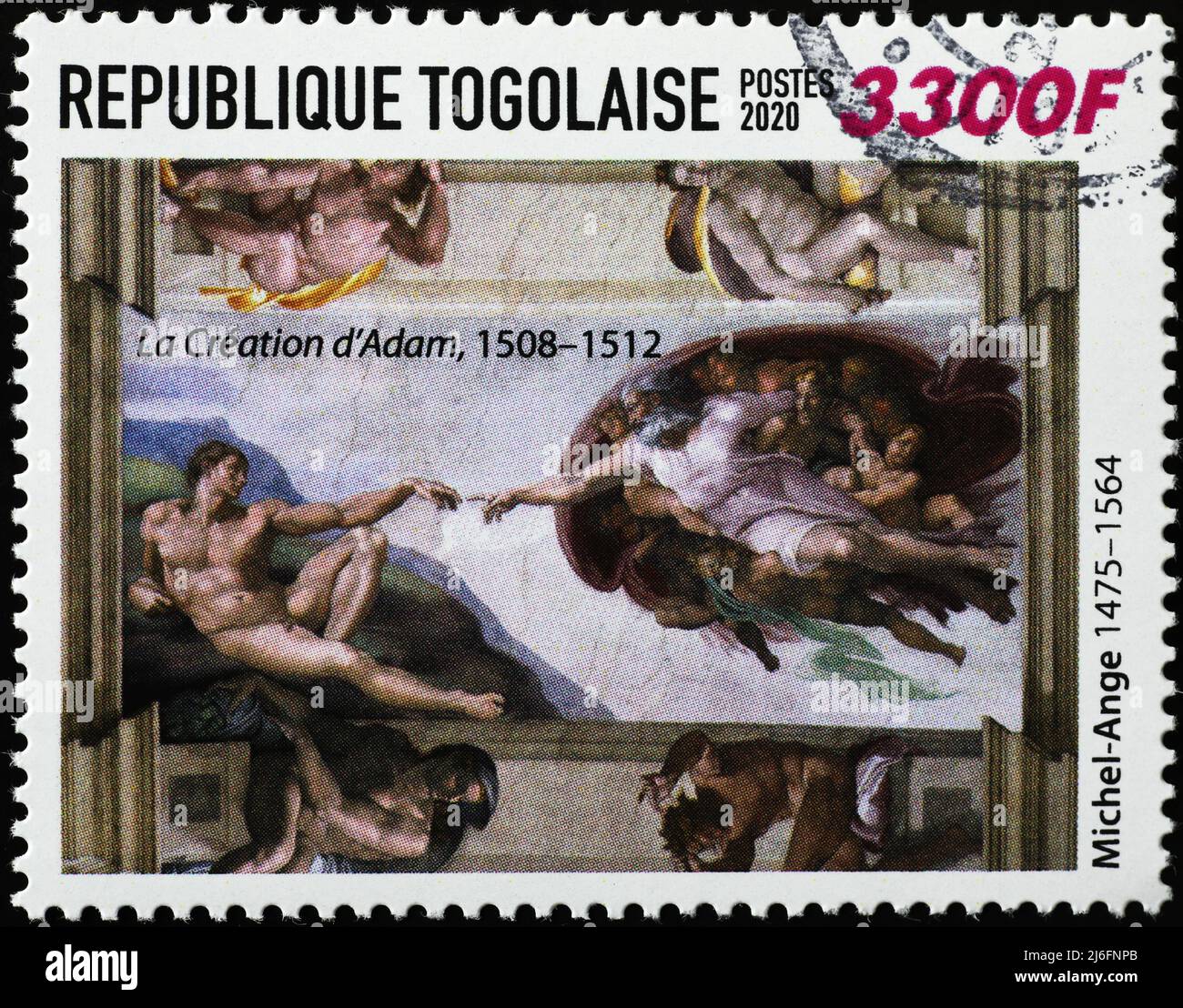 Création de l'homme par Michel-Ange sur timbre-poste Banque D'Images