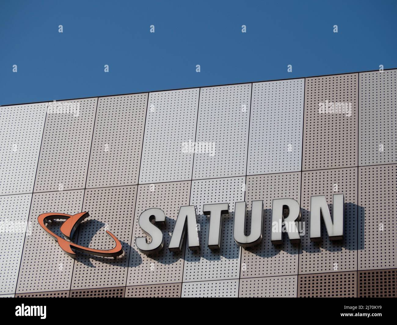Logo Saturn sur la façade du centre commercial Stadtgalerie Banque D'Images