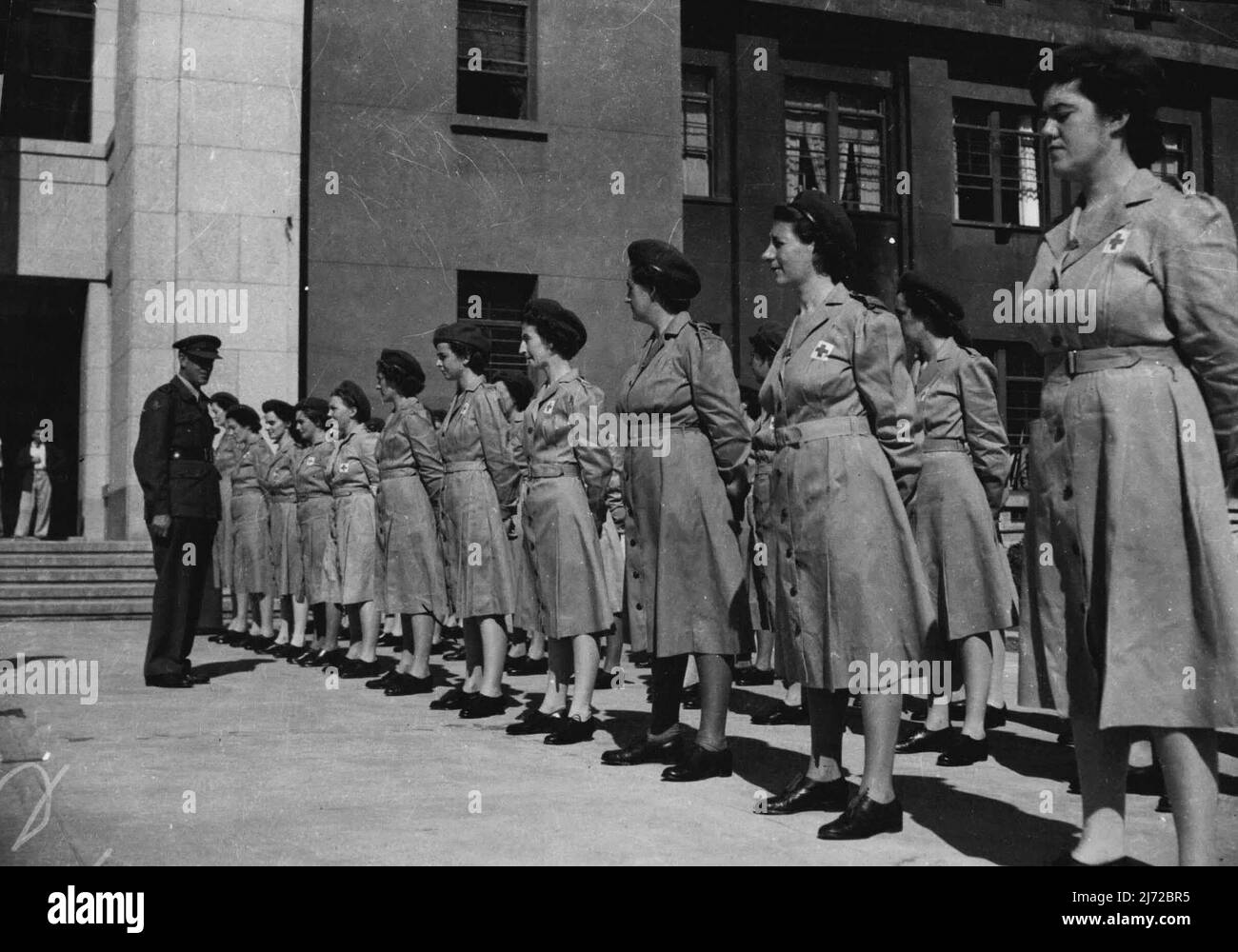 A.A.M.W.S. s'est joint à l'A.G.H. de 130 à l'ETA Jima pour adieu au Lt. Colonel C. Yeatman ancien C.O. homeward en direction de l'Australie. 19 novembre 1946. (Photo de Tolra Pictures). Banque D'Images