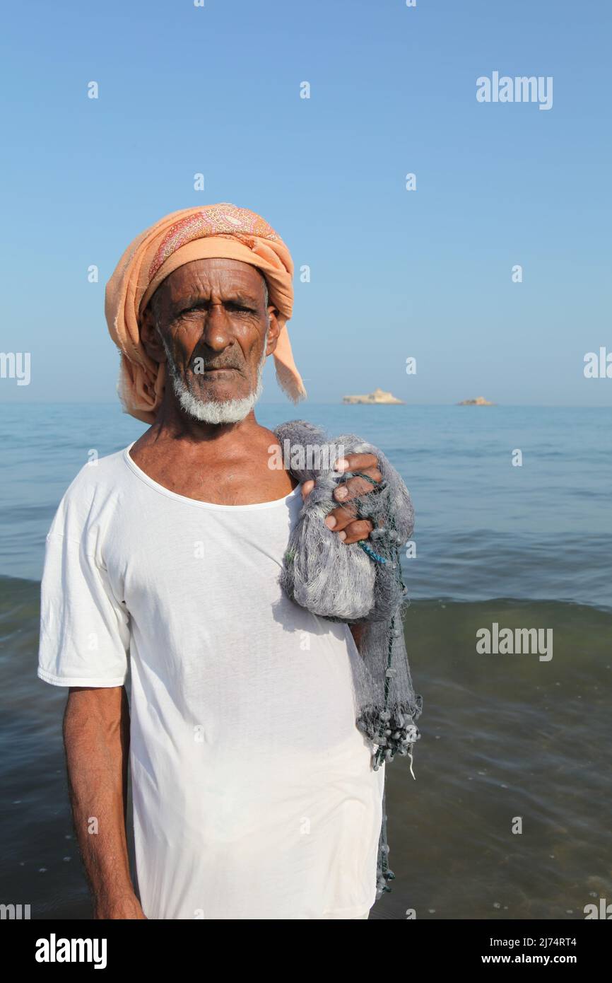 Ancien pêcheur, Sawadi Beach Oman Banque D'Images