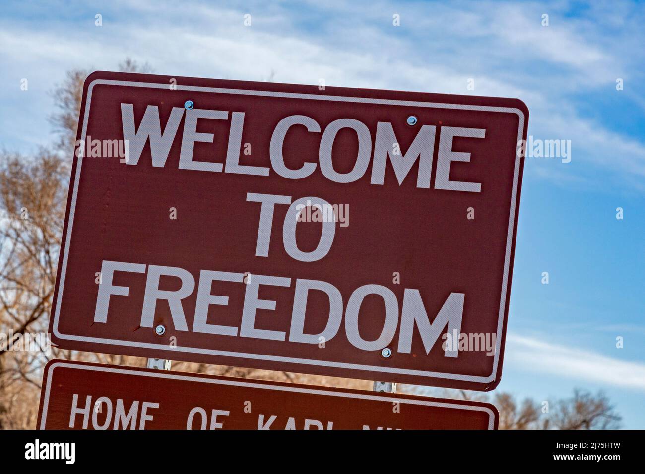 Freedom, Oklahoma - Un panneau routier aux limites de la ville de Freedom, une petite ville de l'ouest de l'Oklahoma. Banque D'Images