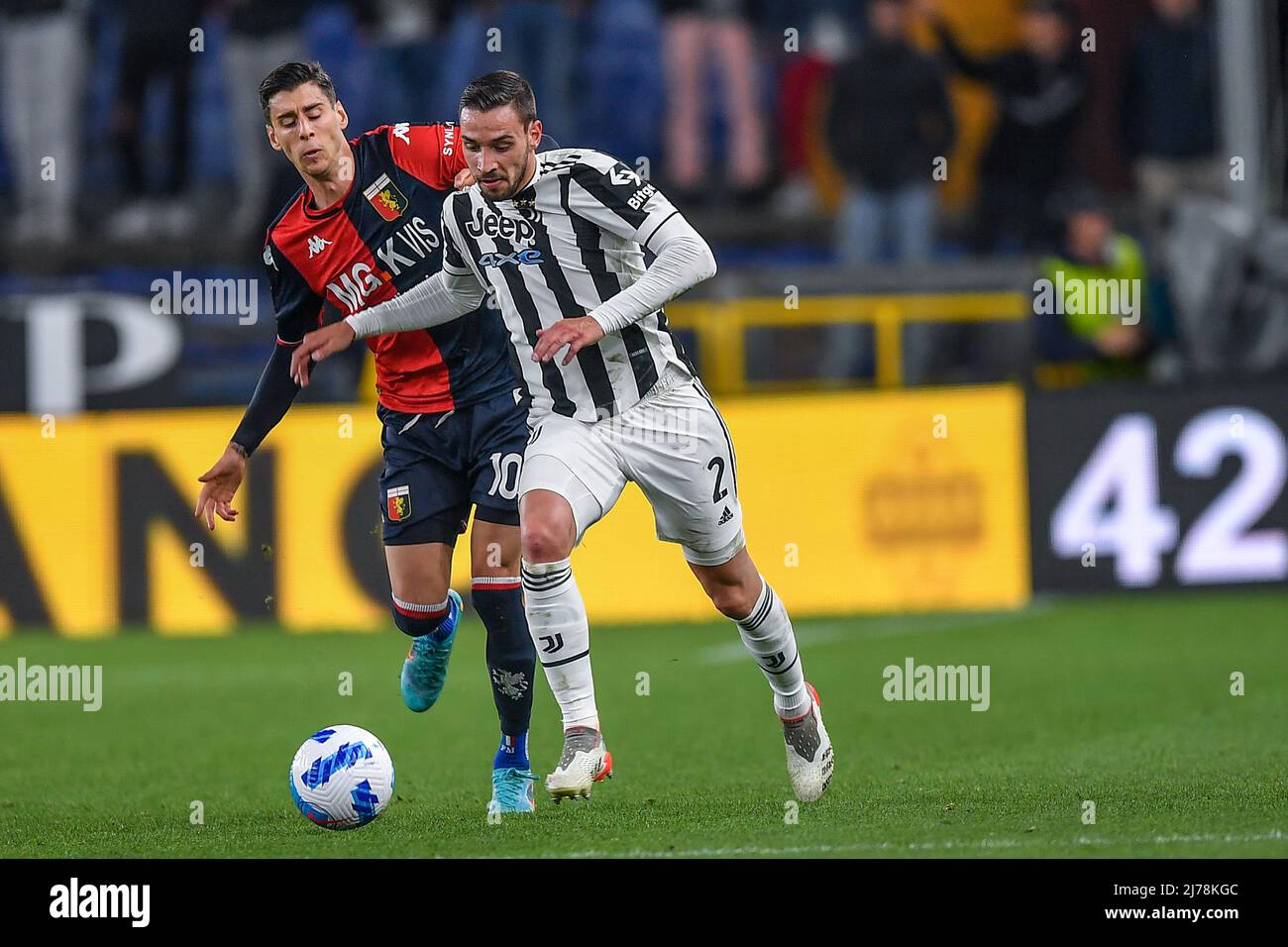 Victor Osimhen of Napoli and Stefano Sabelli of Genoa vie for the