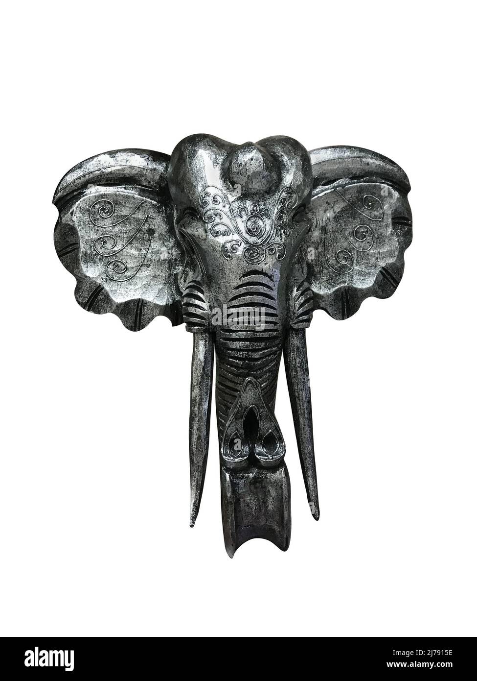 Tête de figurine d'un éléphant indien avec des motifs isolés sur fond blanc. dieu ganesha. Photo de haute qualité Banque D'Images