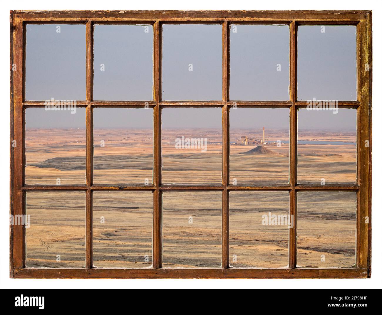 Coucher de soleil au-dessus des contreforts et des plaines du Colorado du nord, vue depuis la fenêtre de guillotine d'époque Banque D'Images