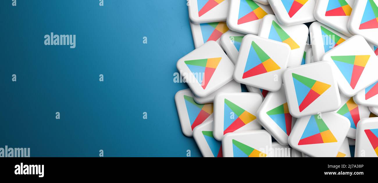 Logos de la boutique d'applications Google Play pour Android sur un tas sur une table. Copier l'espace. Format de bannière Web. Banque D'Images