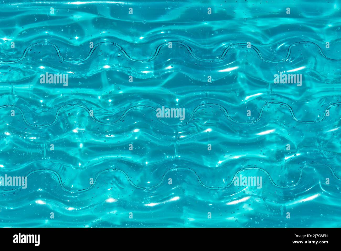 Texture du matelas gonflable couleur aqua sur l'eau Banque D'Images