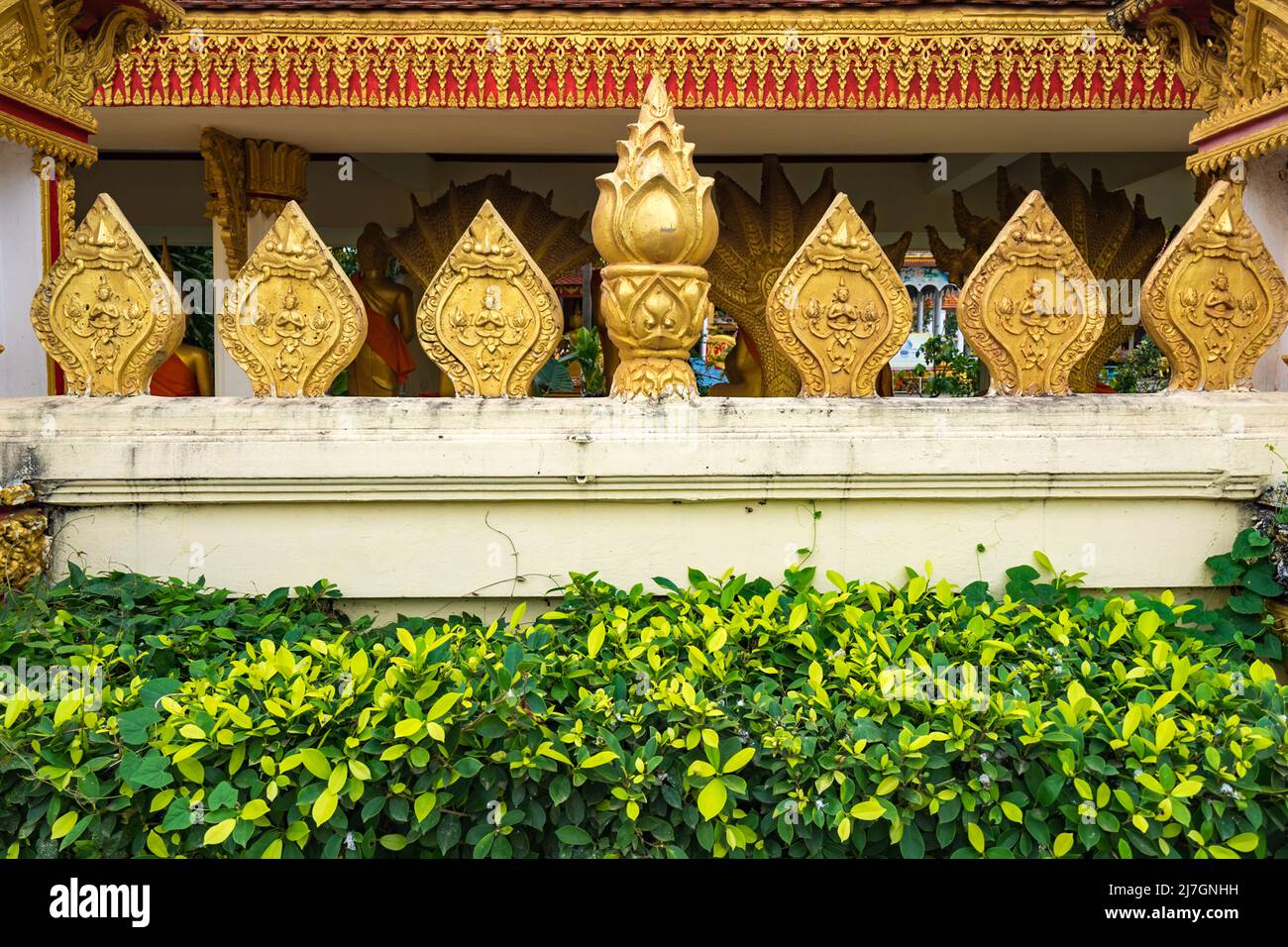 Reliefs décoratifs sur Pha que la pagode Luang au Laos Banque D'Images