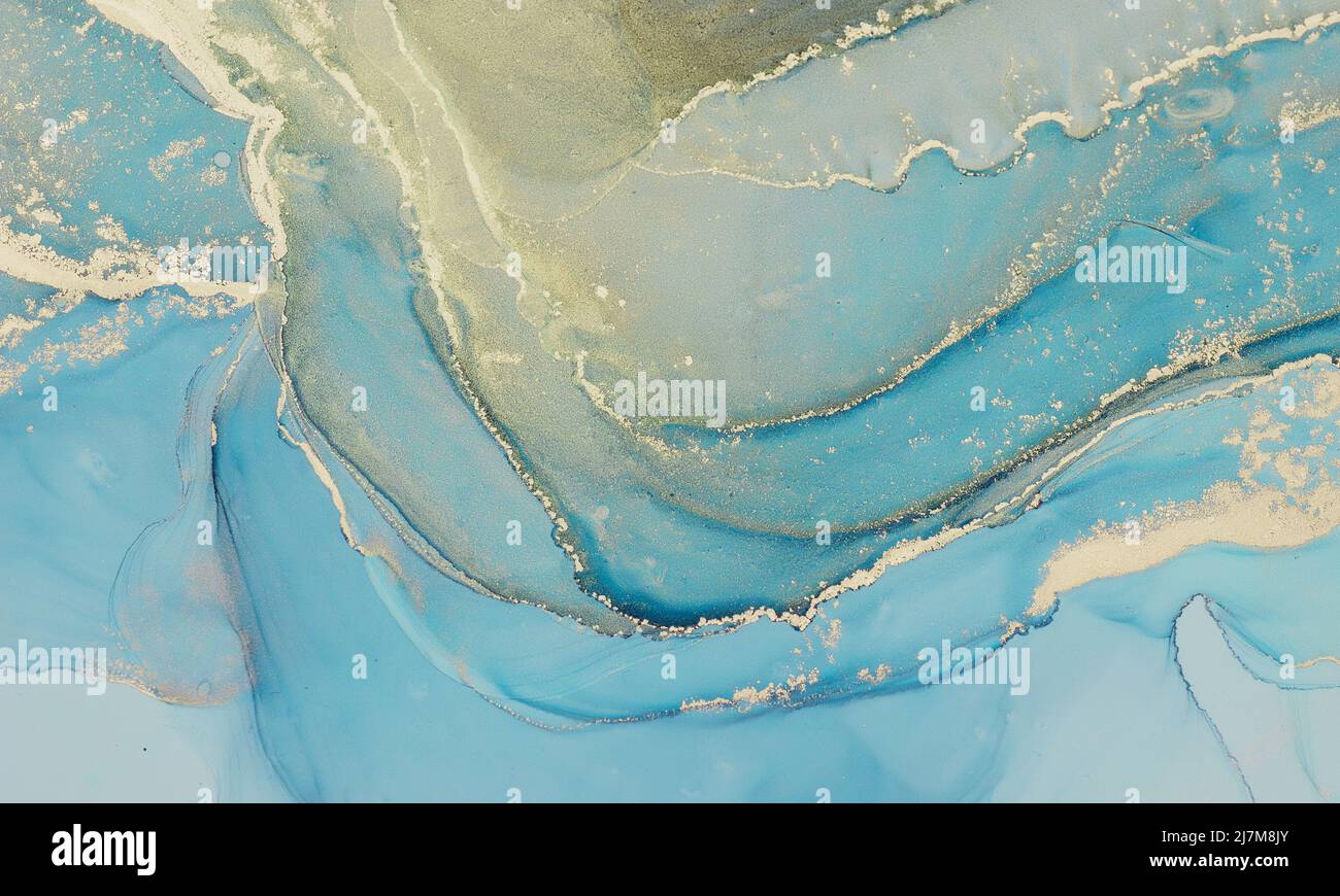Arrière-plan abstrait de peinture à l'encre fluide dans des couleurs pastel avec des éclaboussures d'or Banque D'Images