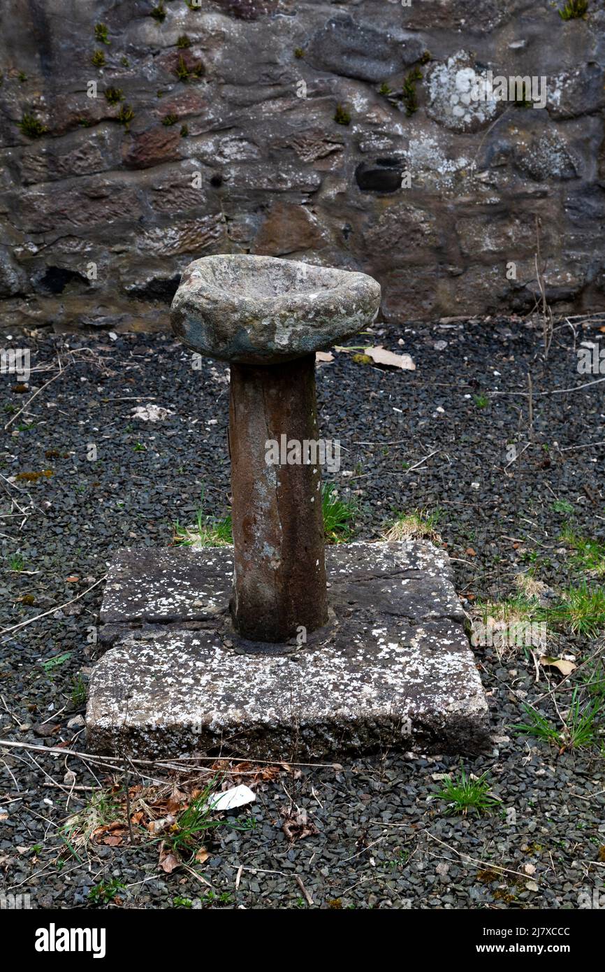 Police de 12th-siècle croyait utilisée dans le baptême de Robert le Bruce. La police a été sauvée de l'abbaye de Crossraguel et déplacée à la vieille église de Kirkoswald Banque D'Images