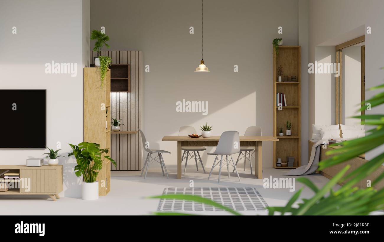 Décoration intérieure moderne blanche de la salle à manger avec une table à manger en bois élégante, chaises en bois près de la fenêtre en verre, étagères en bois et mobilier pour dec Banque D'Images