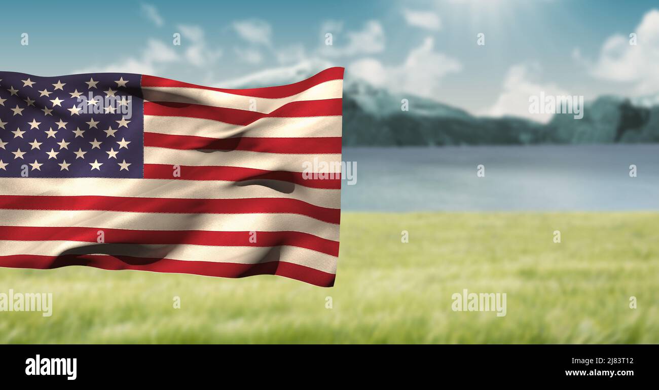 Image composite d'un drapeau américain agité contre un paysage avec des prairies et des montagnes Banque D'Images