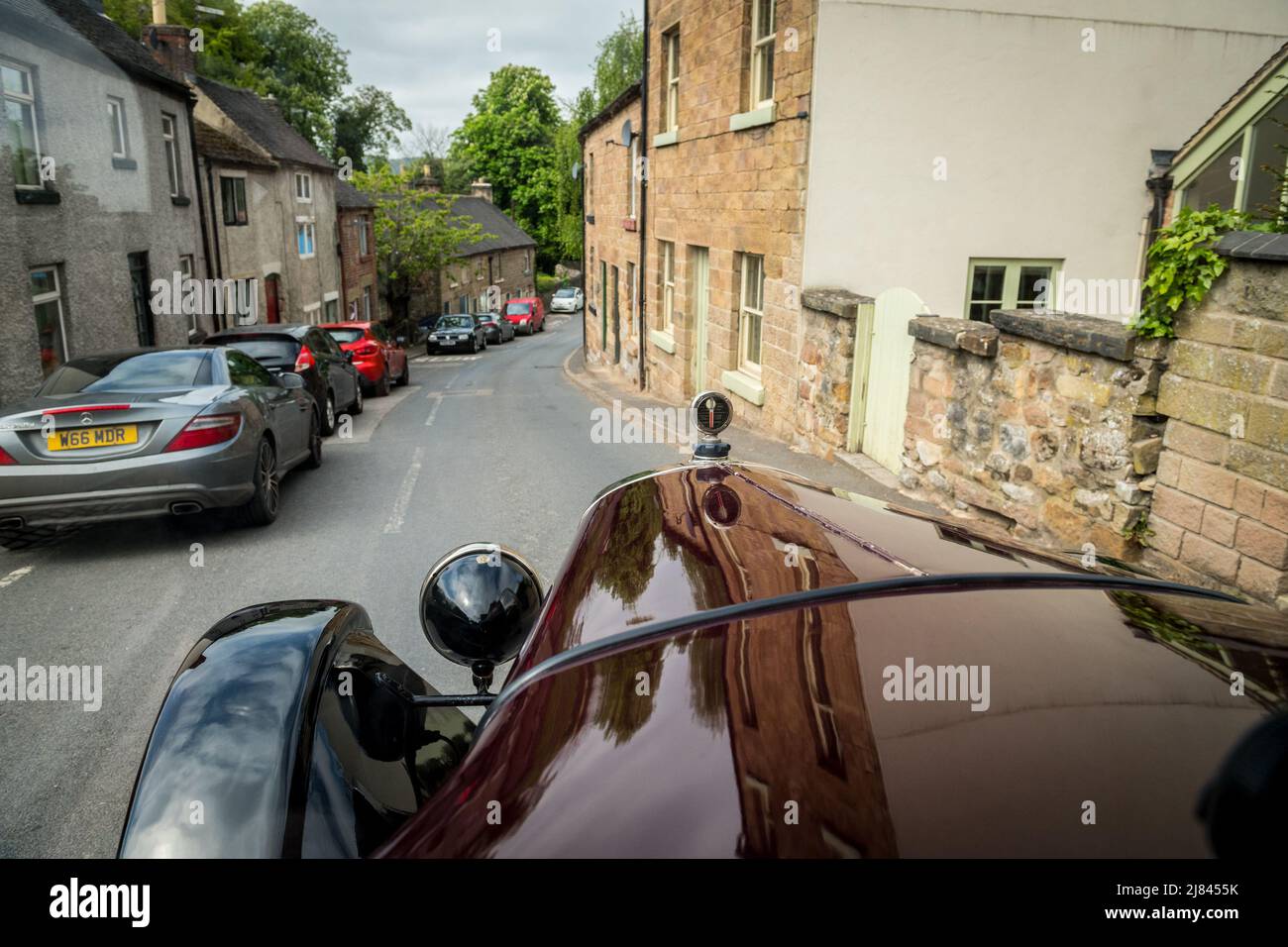 À l'intérieur d'une voiture d'époque Austin 12, qui participe à la tournée « Century of Sevens Celebration » du club automobile d'Austin 7 avant la guerre, dans le quartier des pics du Derbyshire. Banque D'Images